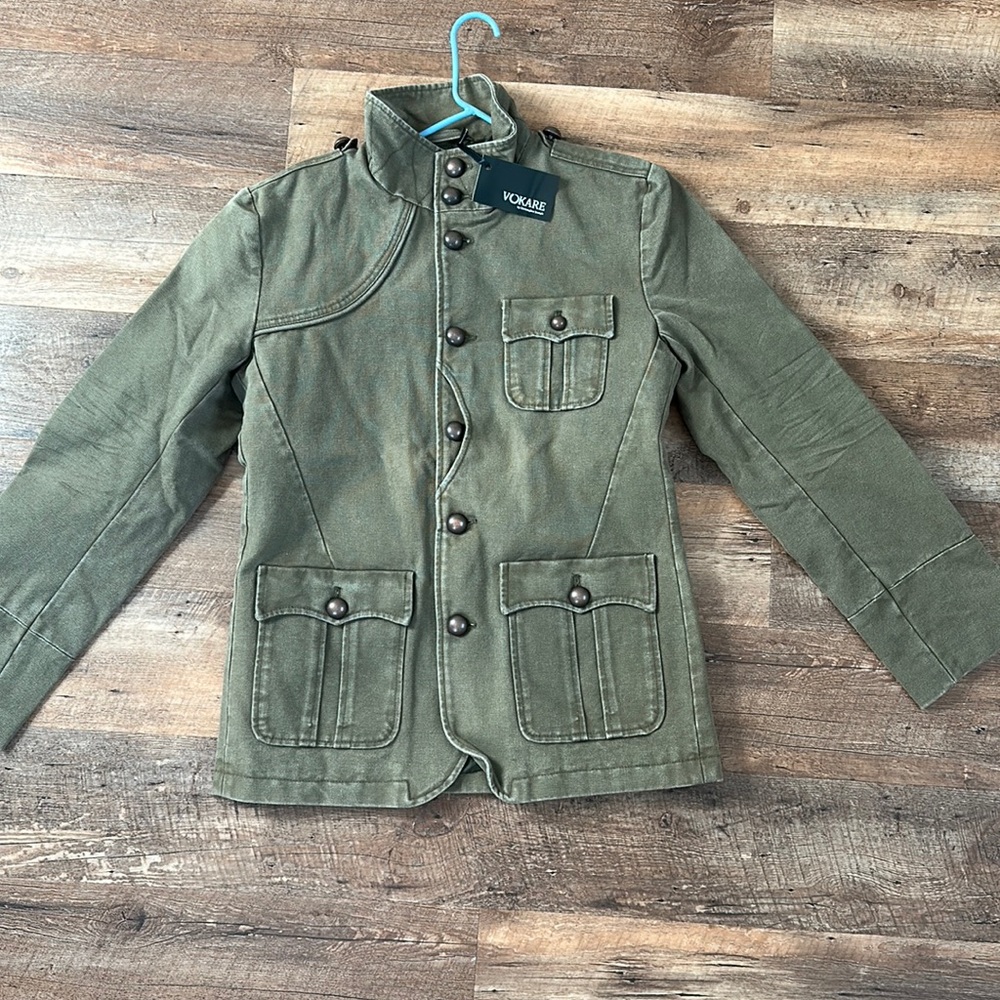 Army green military styled jacket, has buttons front and back. Keeps you warm.